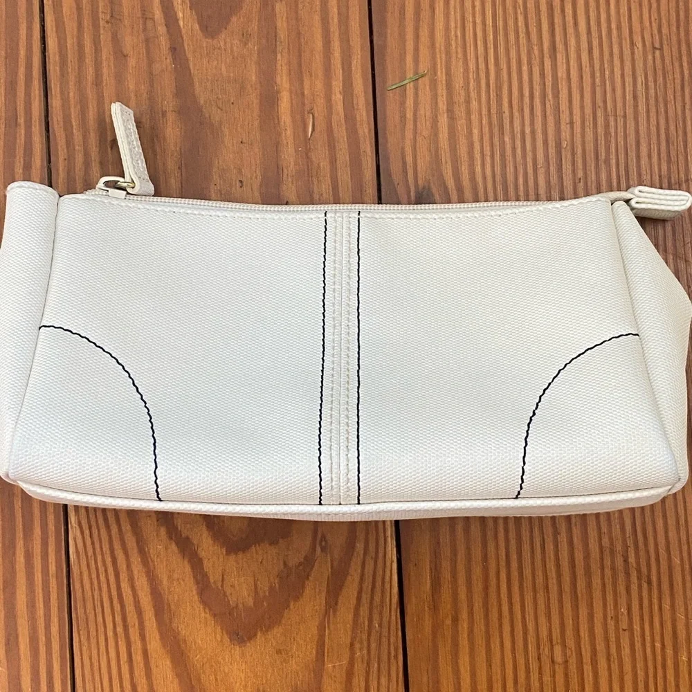 GUERLAIN Elegant Cream Cosmetic Bag with Blue Accents